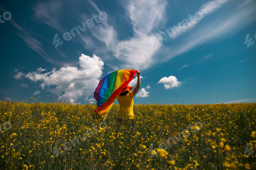Preview: Young woman with LGBT flag.