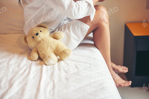 Preview: Happy Child hug teddy bear in green park playground