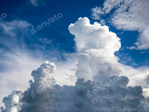 Preview: Blue sky fluffy white clouds on summer season bright clear skyline with beautiful cloudscape. Panora