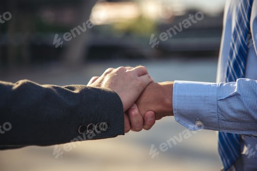 Preview: Business people shaking hands together. Group of Businesspeople Trust partner hands stack. Business