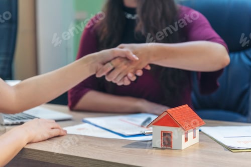 Preview: Team diversity women selling house real estate agent at office desk