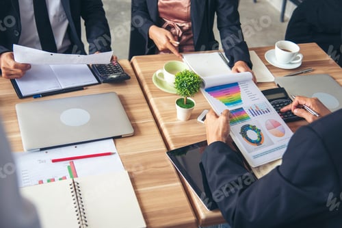Preview: Group of business people meeting in conference room brainstorming consult business document graph ch