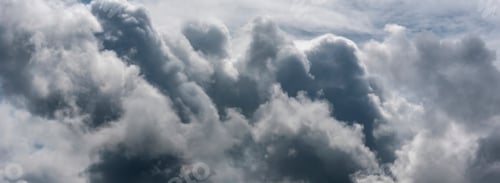 Preview: Banner Dramatic dark storm clouds black sky background. Dark thunderstorm clouds rainny season. Pano