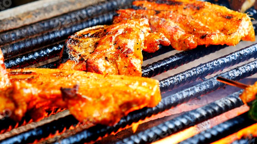 Preview: BBQ Barbecue grilled meat stick on fire flame with hot charcoal cooking outside. Beef grilling picni