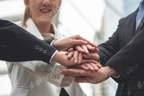Preview: Multiethnic Teamwork friendship group brainstorming togetherness. Business people team holding hands