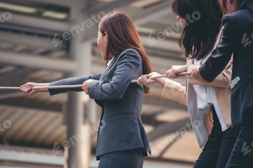 Preview: Tug of war Businesswoman Team holding hands together partnership leader teamwork. Group of business