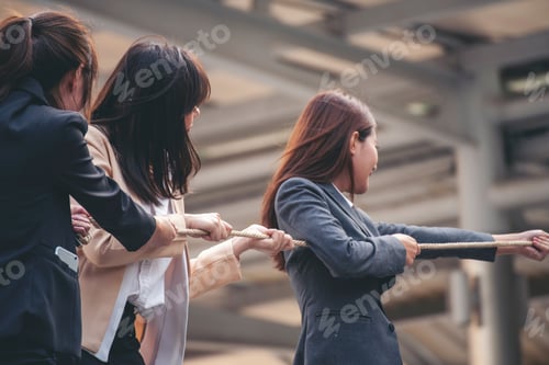 Preview: Tug of war Businesswoman Team holding hands together partnership leader teamwork. Group of business