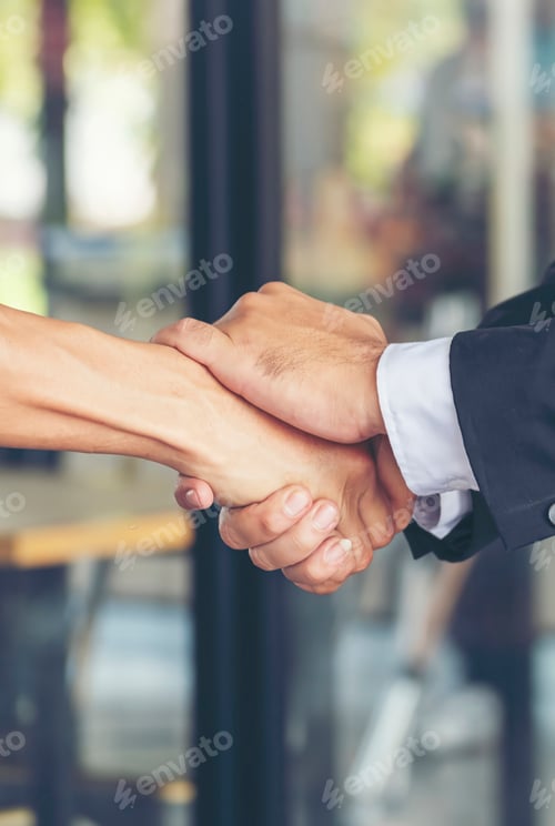 Preview: Vertical Businessman shaking hands together team partnership teamwork. Trust honesty business custom