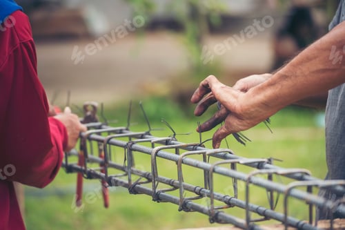 Preview: Construction Worker hands using pincer pliers iron wire. Outdoor Worker using wire bending pliers, c