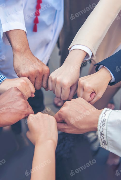 Preview: Vertical Partners hands together teamwork group of business people meeting in firm company office. V