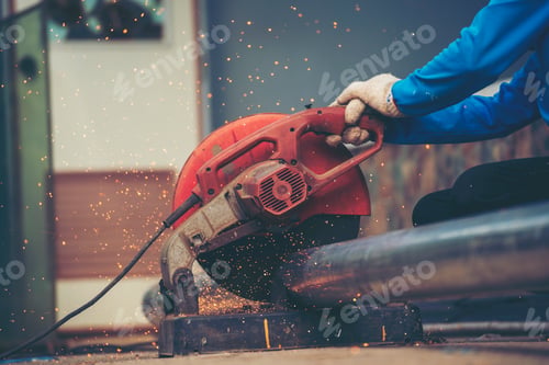 Preview: Construction Worker hands using Welding machinery iron metal sparking. Men hands wear protective glo