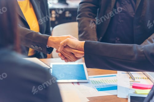 Preview: Team Business Partners shaking hands together to Greeting Start up small business in meeting room. S