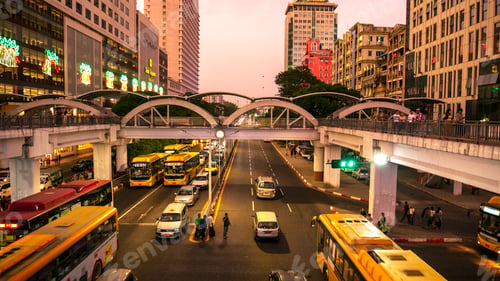 Preview: Streets of downtown Yangon Myanmar road to Sule Gold Pagoda sunset with traffic jam and modern city