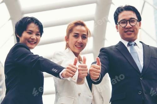 Preview: Teamwork Together Concept. Group of diversity people high five on air to greeting power of tag team.