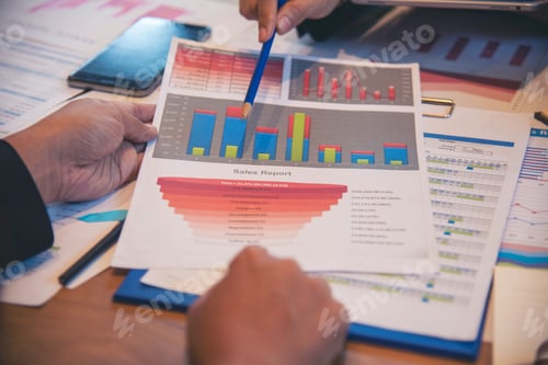 Preview: Two businesspeople meeting work at office desk. Teamwork partners team with Business strategy chart