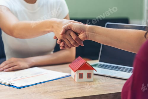 Preview: Team diversity women selling house real estate agent at office desk