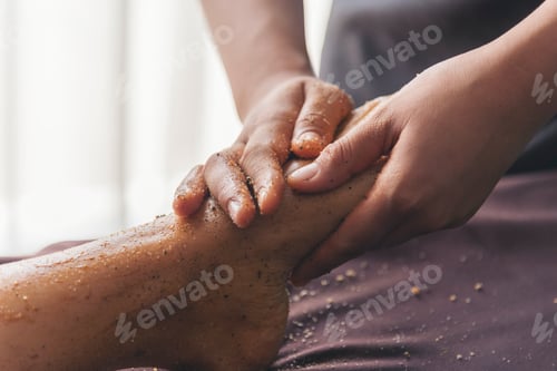Preview: Massage Thai Spa foot massage. Close up woman leg side therapy relax treatment in spa salon. Spa bod