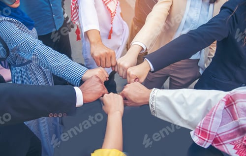 Preview: Diverse multiethnic Partners hands together teamwork group of multiracial people meeting join hands