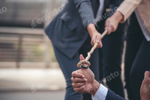 Preview: Tug of war Group of business people Hands pulling rope symbol team unified teamwork Partnership Conc