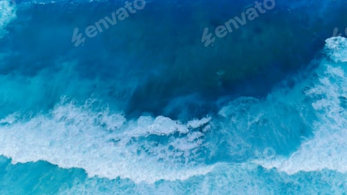 Preview: Turquoise ocean sea water white wave pattern splashing deep blue sea. Seascape dark ocean background