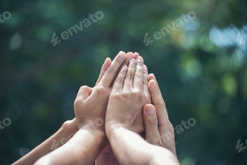 Preview: Diversity multiethnic high five group of business people success team hands together. Collaborate Vo