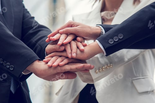 Preview: Multiethnic Teamwork friendship group brainstorming togetherness. Business people team holding hands