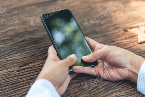 Preview: Close up woman hands using smartphone online video call texting message. Female hand touch empty scr