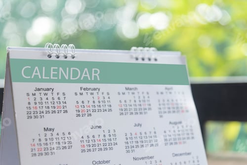 Preview: 2019 Calendar Event Planner. Close up on calendar on desk with bokeh and sun light as a background w