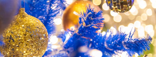 Preview: Banner Blurred Background Blue Christmas tree decorated gold bauble ornament in holiday winter xmas
