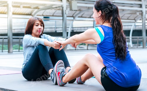 Preview: Sport Fitness Two Woman stretching body exercise modern city wear sportswear together. Young asian w