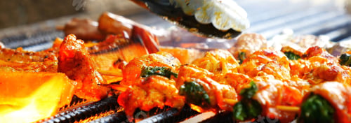 Preview: Banner BBQ Barbecue grilled meat stick on fire flame hot charcoal cooking outdoor. Banner Beef grill