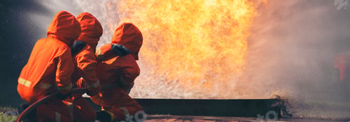 Preview: Firefighter Rescue team training in fire fighting extinguisher. Teamwork Firefighter fighting with f