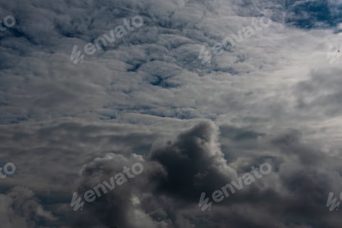 Preview: Dramatic dark storm rain clouds black sky background. Dark thunderstorm clouds rainny atmosphere. Me