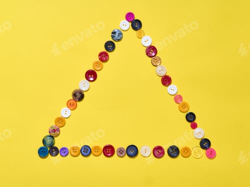 Preview: Triangle frame made of colorful buttons