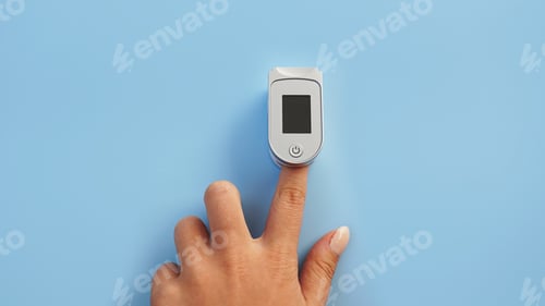 Preview: Medical device for hypoxia. Female finger in a pulse oximeter