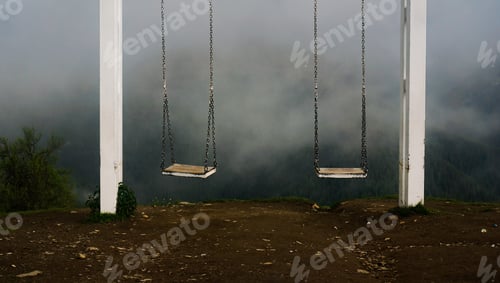 Preview: The sight of Svaneti - swing in mountains. Empty swing against foggy mountains