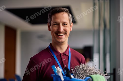Preview: Portrait of professional male cleaner at work looking at camera.