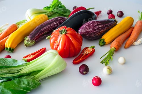Preview: Bright vegetable set for kids cooking on white table with eggplant