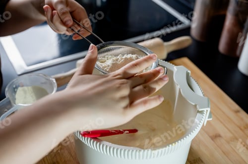 Preview: Sifting Flour into Sponge Cake Batter by Hand