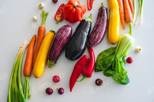 Preview: Closeup of colorful garden vegetables showing textures of eggplant