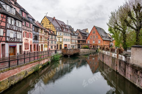 Preview: Vibrant timbered houses lining narrow canal