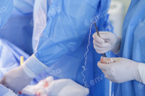 Preview: Surgeon Performing Hip Replacement Surgery with Innovative Equipment