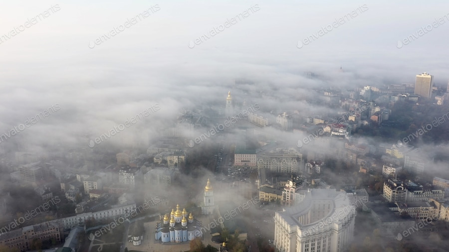 Cover for Aerial view of the city in the fog