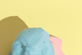 Stylish summer accessories cap and sunglasses. Fashion still life concept