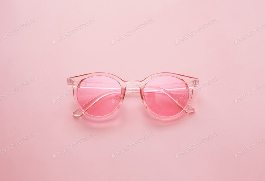 Cover for Pink retro style sunglasses over pink background, trendy 90s style
