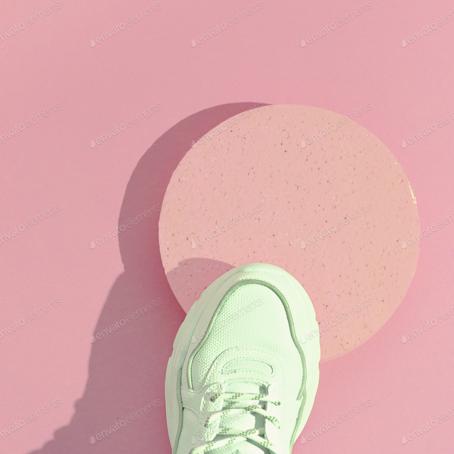 Cover for Minimal still life art. Fashion sport shoes concept. Pink colours trends. Stylish white sneakers