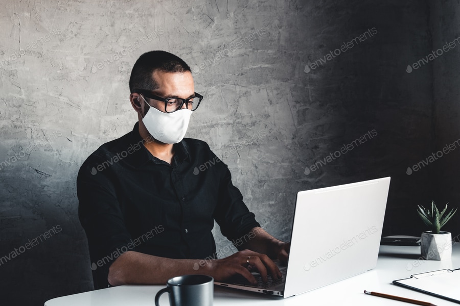 Cover for A man works or study during quarantine at the computer. Pandemic epidemic