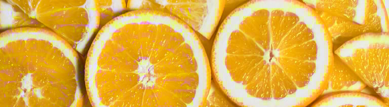Sliced orange background. Food and drink