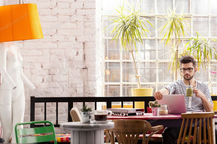 Hipster student working as freelancer