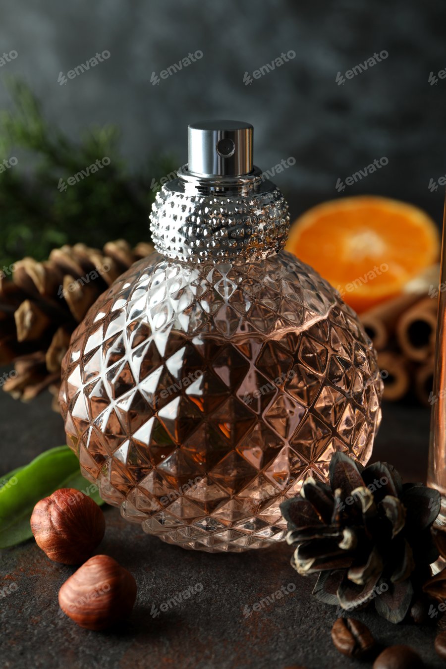 Cover for Concept of fragrant flavored perfume, close up